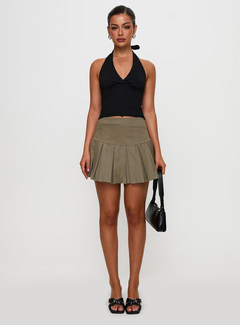  front view of model wearing Princess Polly Feodora Pleat Mini Skirt Khaki Mini Skirts Skirts 