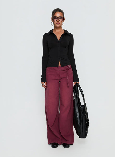 front view of model wearing Princess Polly Boxie Mid Rise Wide Leg Jeans Washed Burgundy Mid Rise Jeans Jeans 