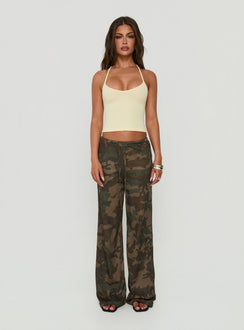 Showcasing the Seylah Waffle Jersey Pants in camo print, womens regular pants with mid-rise waist and wide-leg silhouette, front view of model wearing