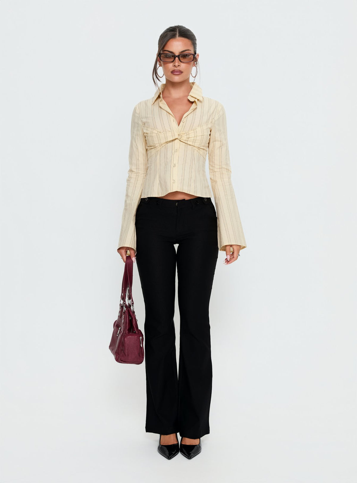 front view of model wearing Princess Polly Dariana Flare Pants Black Mid Rise Pants Pants 