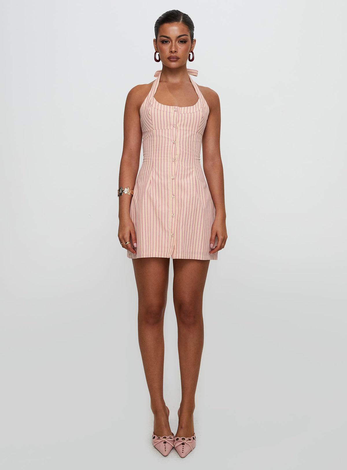 side view of model wearing Princess Polly Mallorie Halter Mini Dress Pink Stripe Scoop Neck 