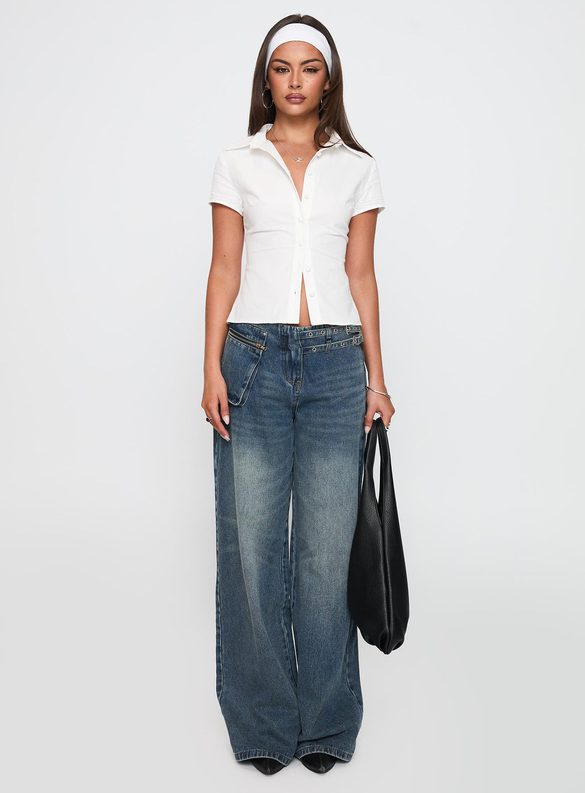 side view of model wearing Princess Polly Lift Off Button Up Top White Short Sleeves V-Neck 