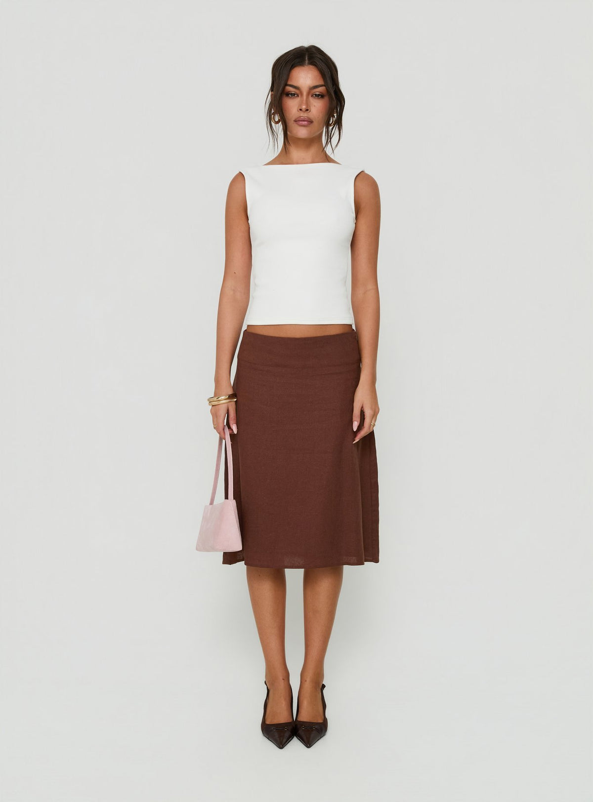 Showcasing the Such Delight Linen Midi Skirt Chocolate in womens-skirts front view of model wearing Princess Polly