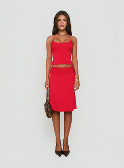 Showcasing the Zenaide Lace Detail Midi Skirt Red in womens-skirts front view of model wearing