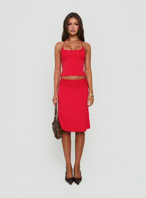 Showcasing the Zenaide Lace Detail Midi Skirt Red in womens-skirts front view of model wearing