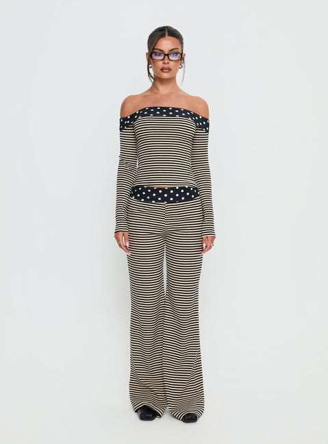 side view of model wearing Princess Polly Virenna Fold Over Pants Black Multi Mid Rise Pants Pants 