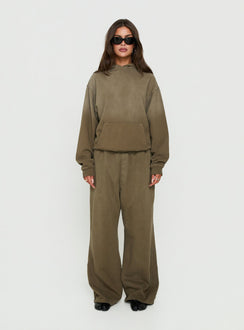Crafted with the AT Pullover Oversized Hoodie Washed Olive in womens-jumpers with long fit front view of model wearing Princess Polly