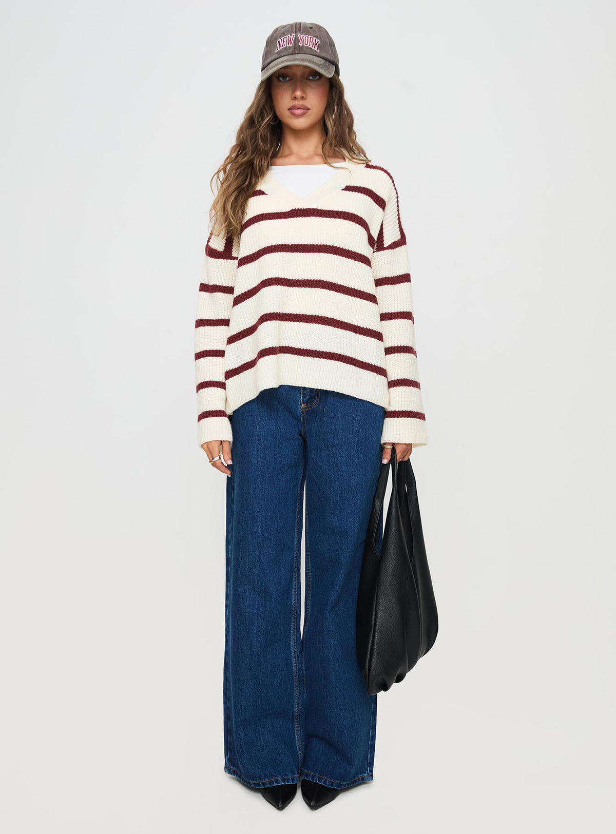 side view of model wearing Princess Polly Forte Knit Sweater Red / Cream Longline Jumpers Jumpers 