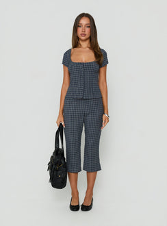 Showcasing the Mayvie Capri Pants Navy Check in womens regular pants with high-rise waist front view of model wearing
