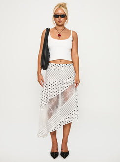   front view of model wearing Princess Polly Rennar Maxi Skirt White / Polka Dot Petite Midi Skirts Skirts 