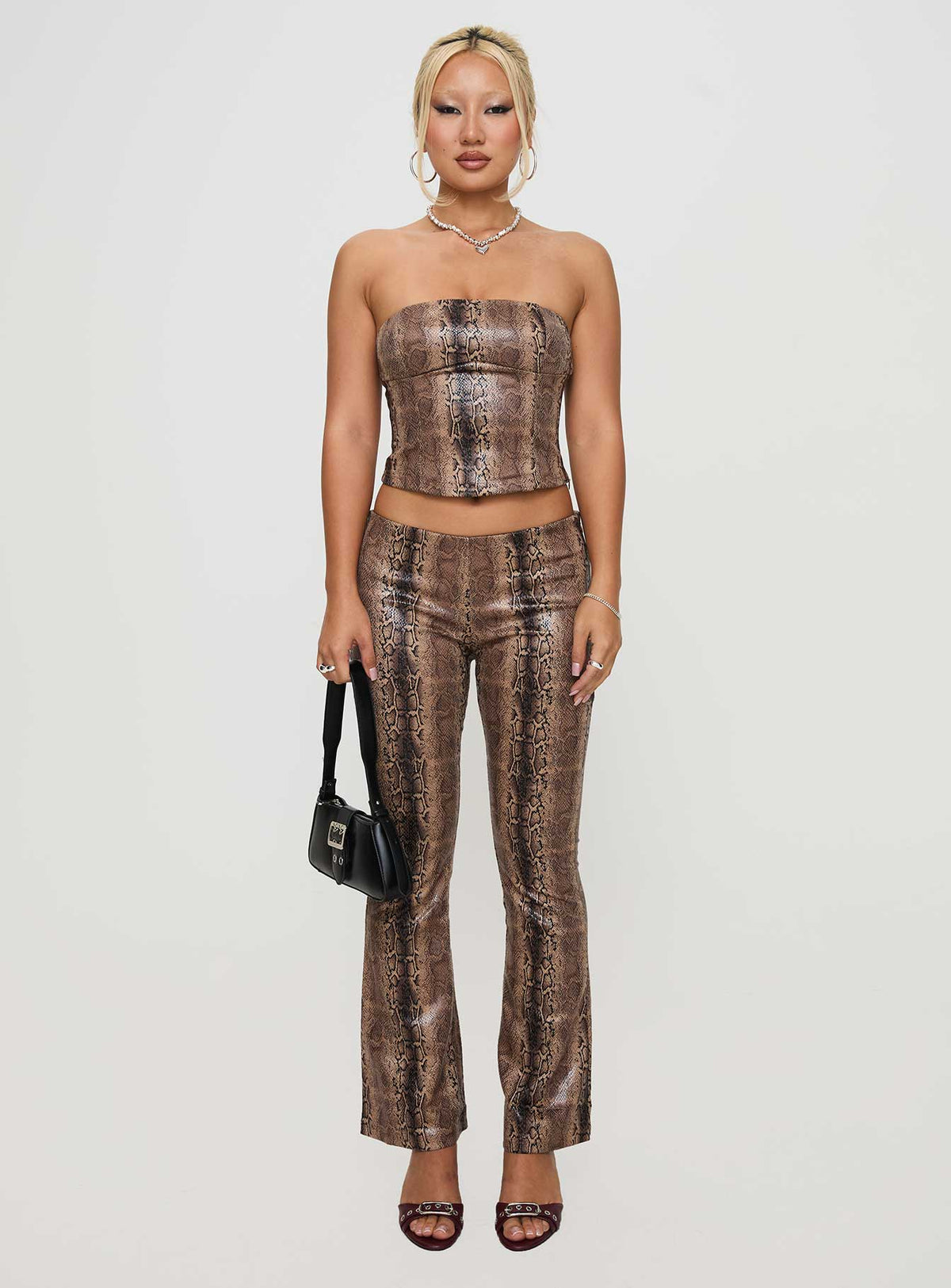 front view of model wearing Princess Polly Slither Pants Snake Print Low Rise Pants Pants 