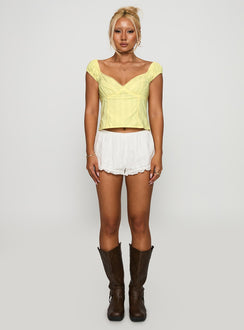 back view of model wearing Princess Polly Fyrie Top Yellow Sleeveless Sweetheart 