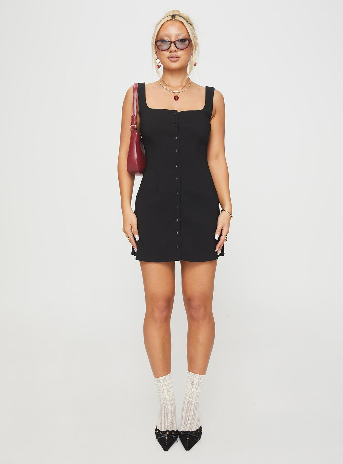 front view of model wearing Princess Polly Zamie Mini Dress Black Square Neck 