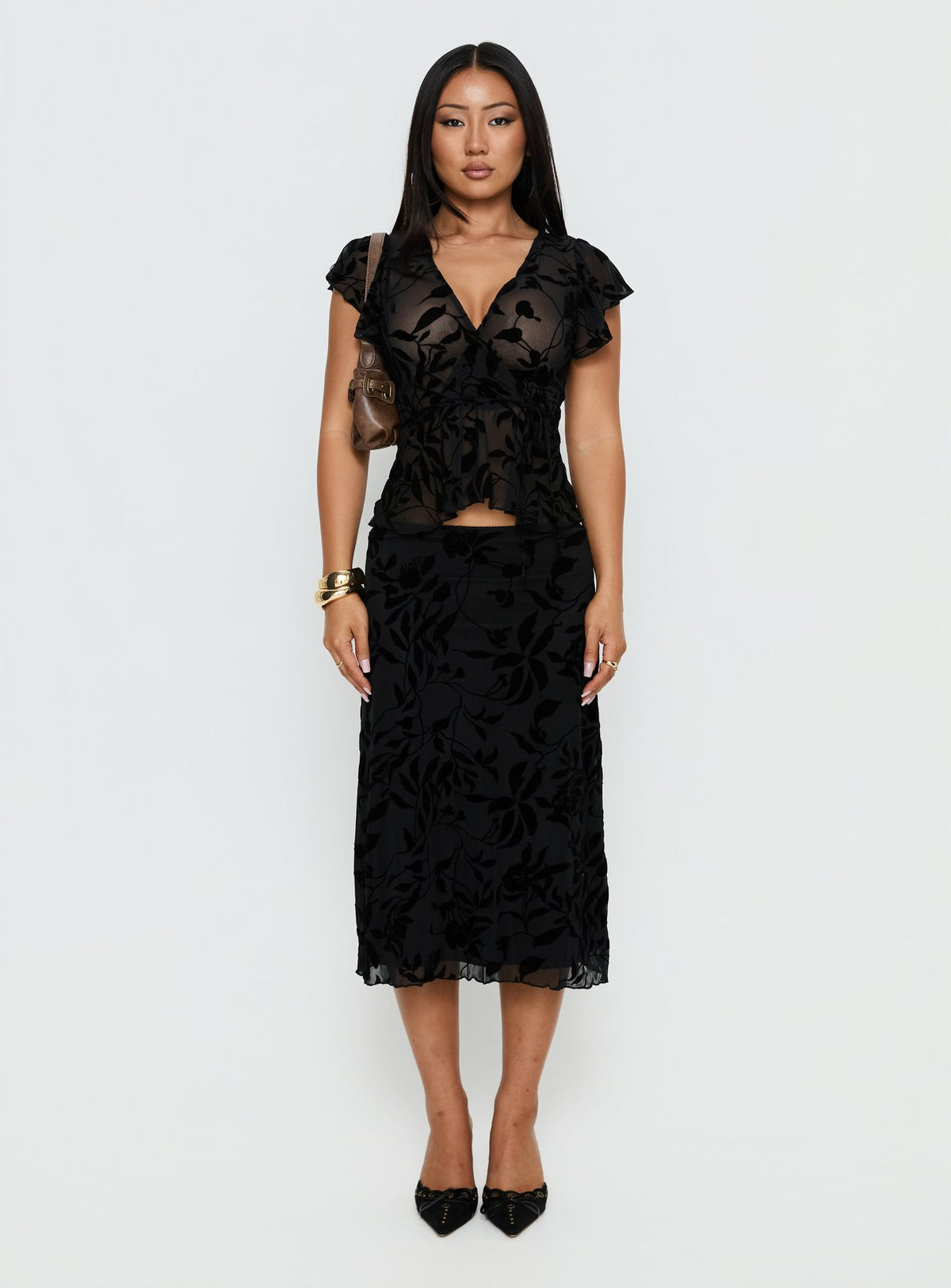   front view of model wearing Princess Polly Atira Midi Skirt Leaf Flower Black Midi Skirts Skirts 