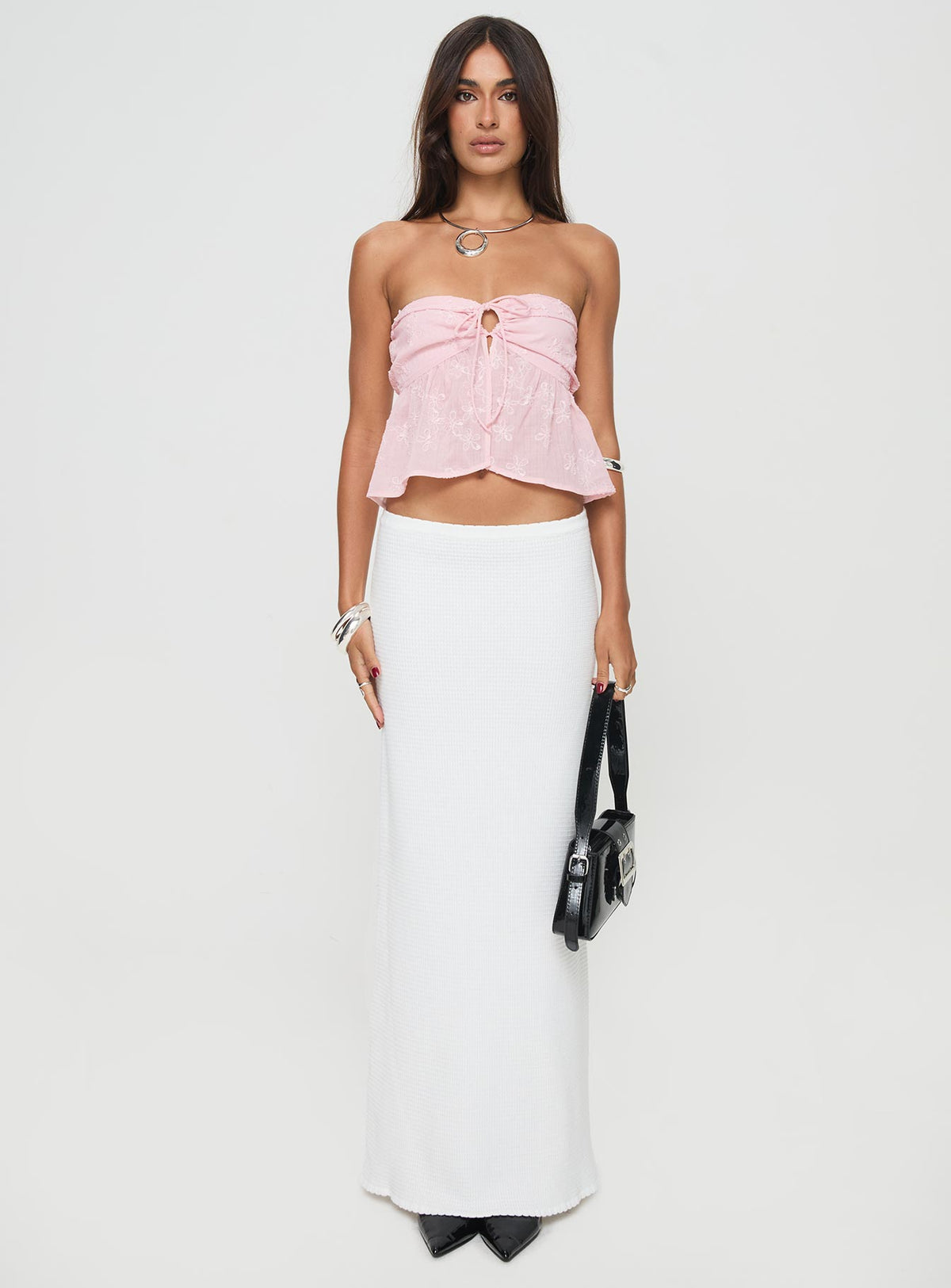side view of model wearing Princess Polly Rosenberg Strapless Top Pink Sleeveless Sweetheart 