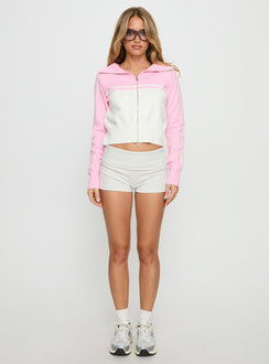 front view of model wearing Princess Polly Take The Lead Zip Through Knit Sweater Pink / White Cropped Jumpers Jumpers 