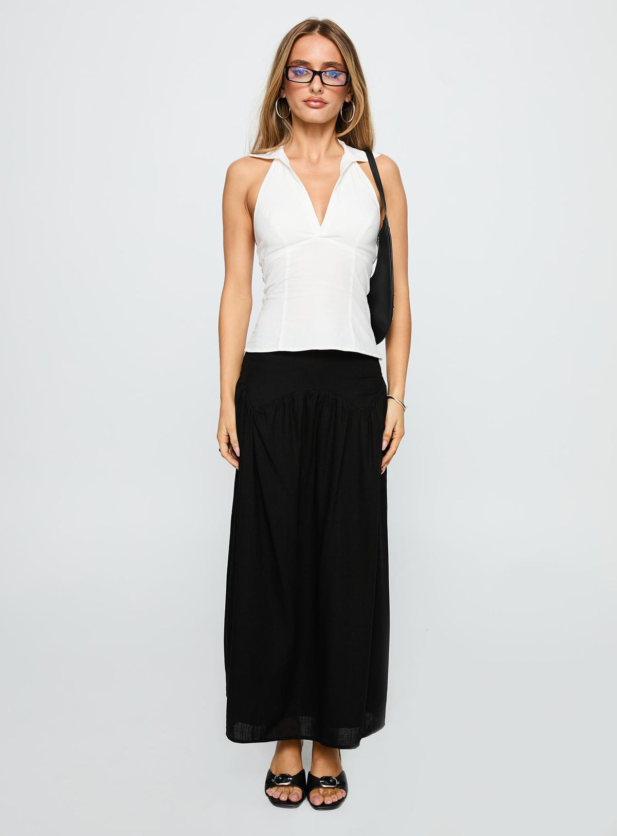 back view of model wearing Princess Polly Human Nurture Maxi Skirt Black Maxi Skirts Skirts 