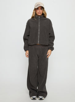 side view of model wearing Princess Polly Siberia Fleece Zip Up Jumper Charcoal regular Jumpers 