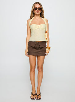 side view of model wearing Princess Polly Isabetta Halter Top Lemon Sleeveless Sweetheart 
