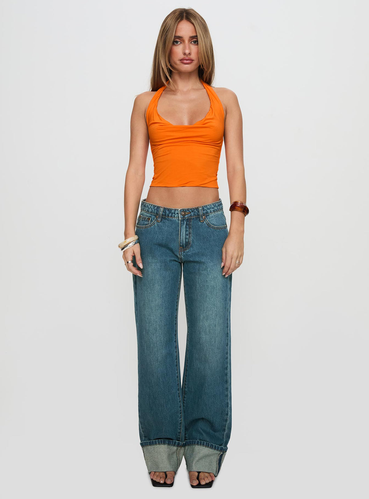 front view of model wearing Princess Polly Toros Mid Rise Wide Leg Foldover Denim Jeans Mid Blue Low Rise Jeans Jeans 