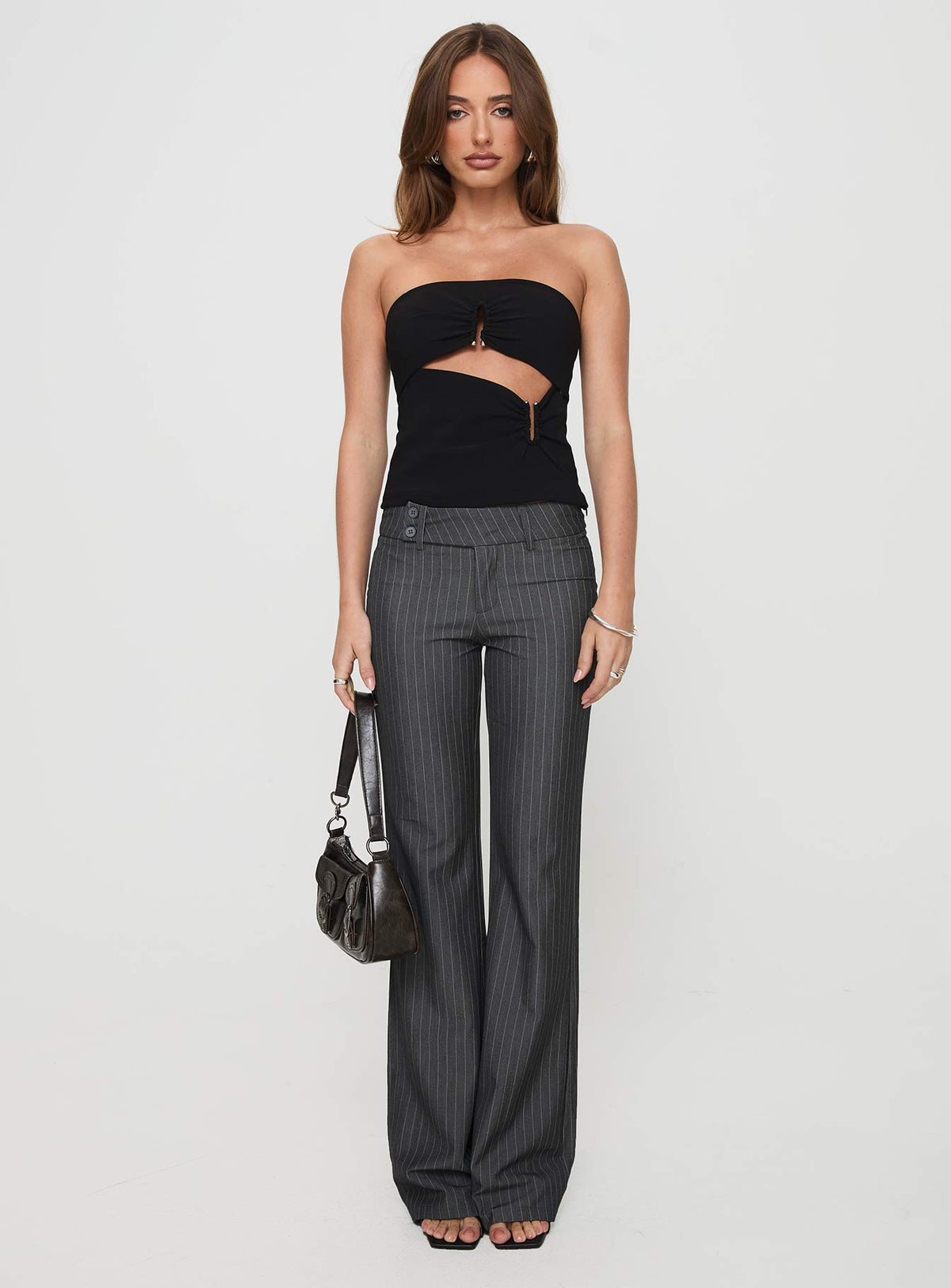 front view of model wearing Princess Polly Kinkirk Flared Pants Grey Pinstripe Low Rise Pants Pants 