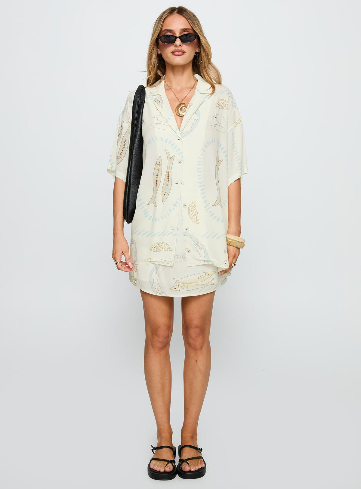 front view of model wearing Princess Polly Caraliia Shirt Cream Half Sleeves V-Neck 