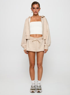 front view of model wearing Princess Polly Down Low Fleece Skort Oat Marle 