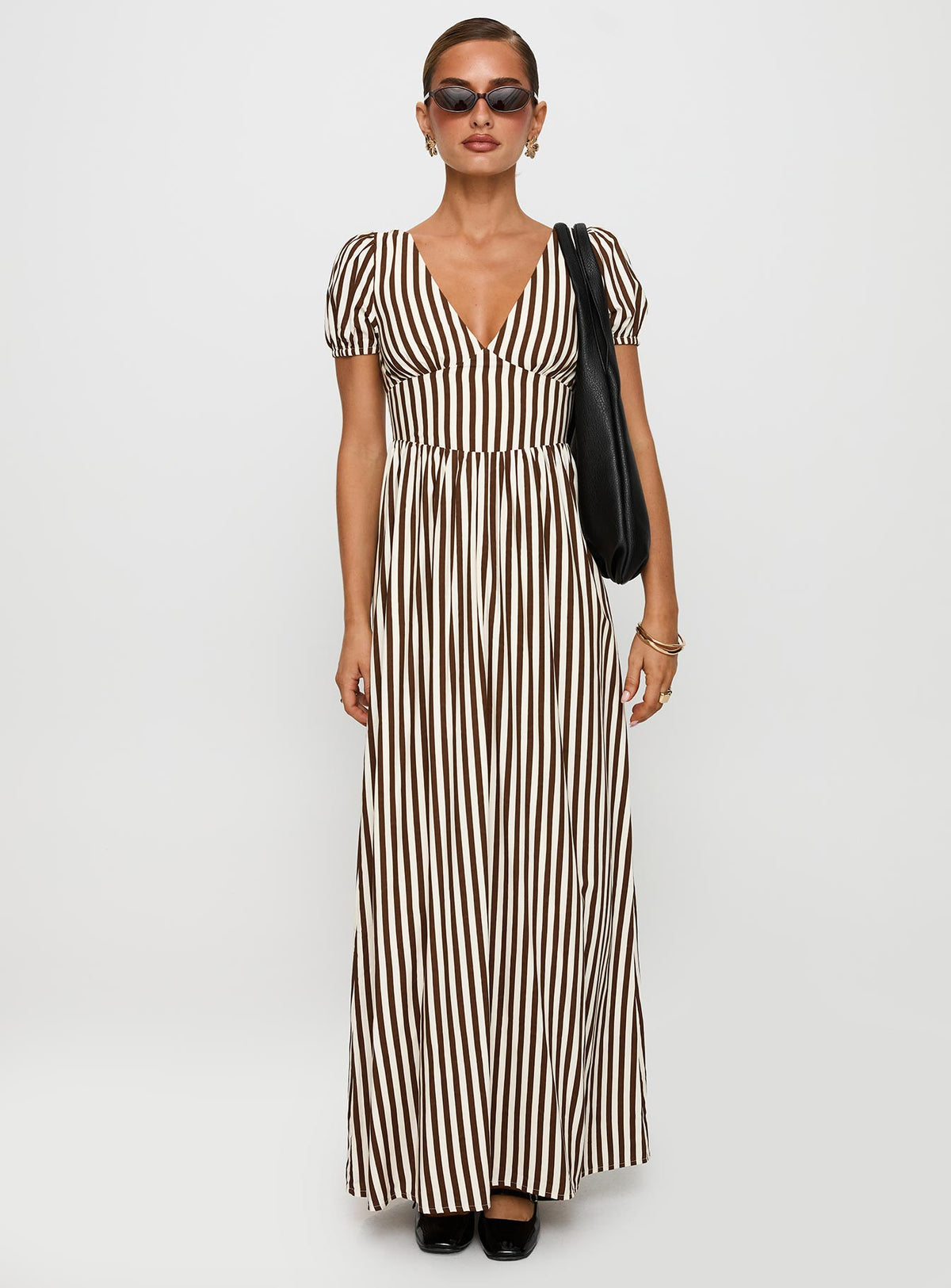 front view of model wearing Princess Polly Collyns Maxi Dress Beige Pinstripe V-Neck 