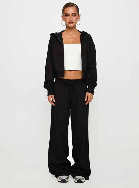 front view of model wearing Princess Polly Mindful Low Rise Pant Black Low Rise Pants Pants 