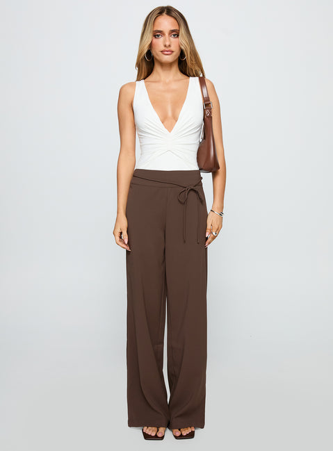 front view of model wearing Princess Polly Rush Hours Pants Chocolate High Rise Pants Pants 