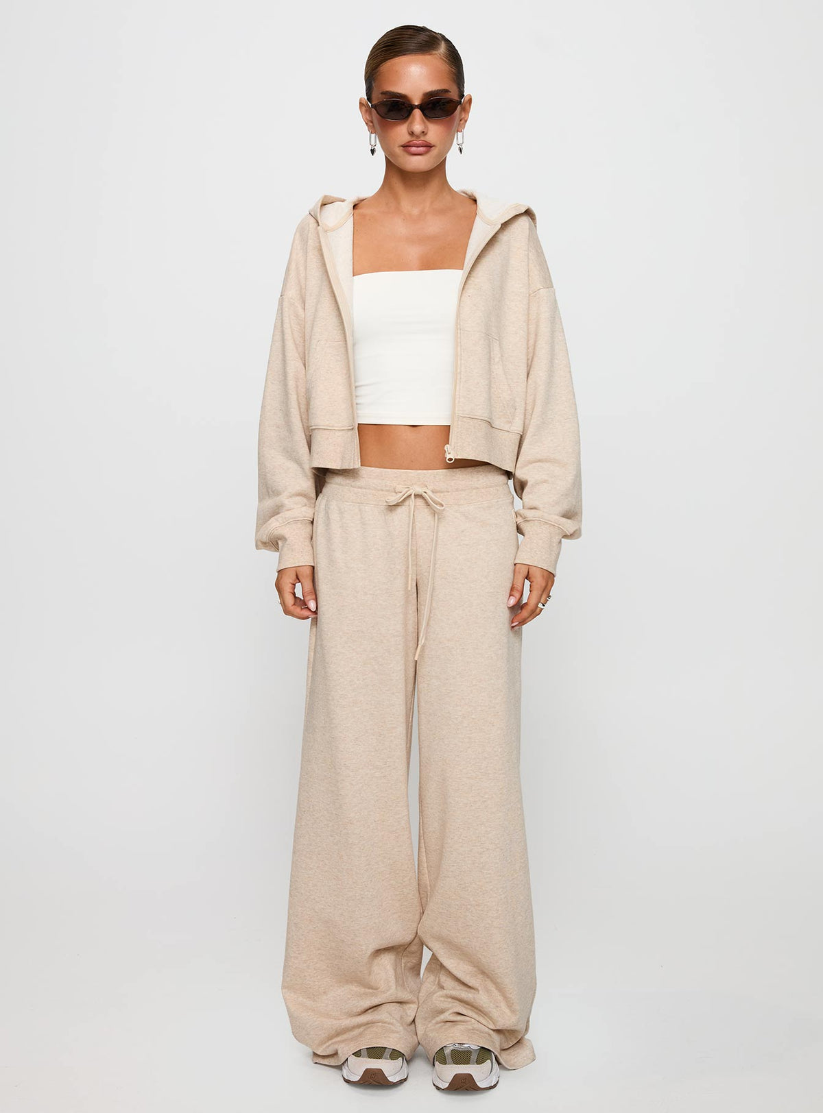 side view of model wearing Princess Polly Mindful Low Rise Pant Oat Marle Pants 