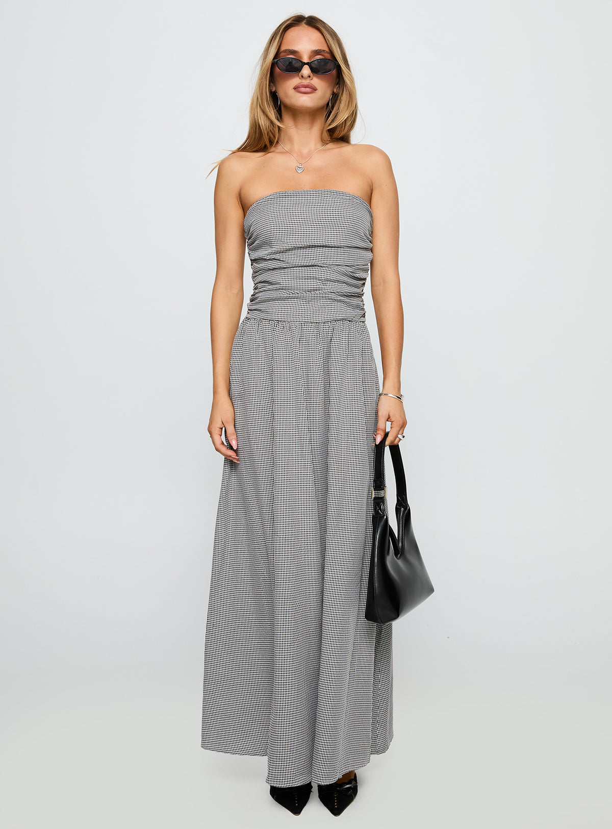 front view of model wearing Princess Polly Arkadia Strapless Maxi Dress Black / White Check Straight Neck 
