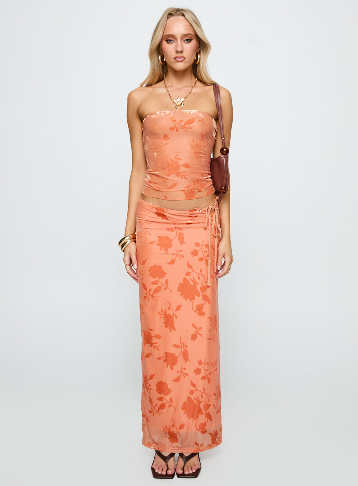   side view of model wearing Princess Polly Mikah Maxi Skirt Orange Maxi Skirts Skirts 