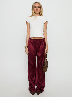 front view of model wearing Princess Polly Soulstar Satin Pants Wine Mid Rise Pants Pants 