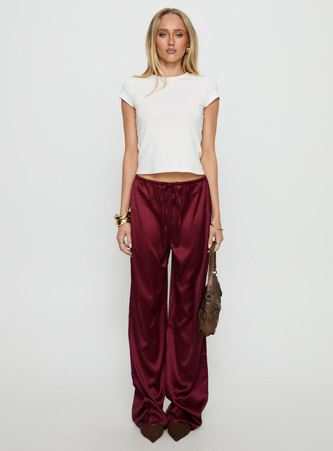 front view of model wearing Princess Polly Soulstar Satin Pants Wine Mid Rise Pants Pants 