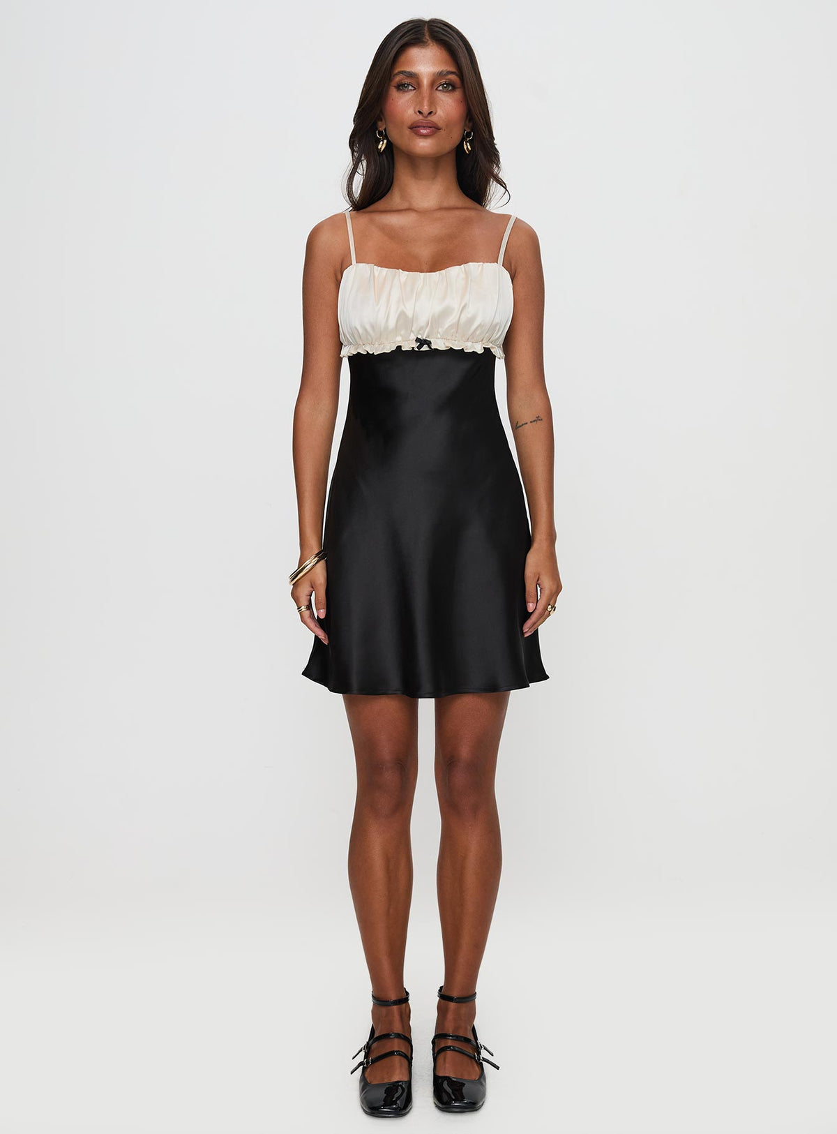 side view of model wearing Princess Polly Cacciatore Mini Dress Black / Cream Sweetheart Neckline 