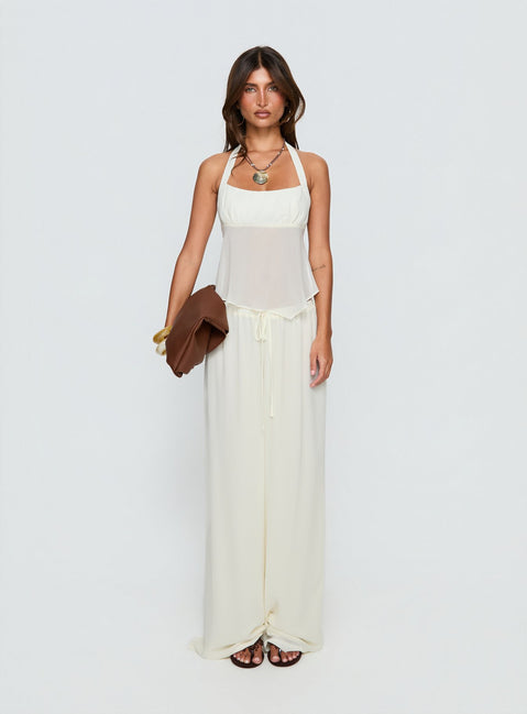 Showcasing the Finesse Pants Yellow womens-regular-pants with mid-rise front view of model wearing Princess Polly