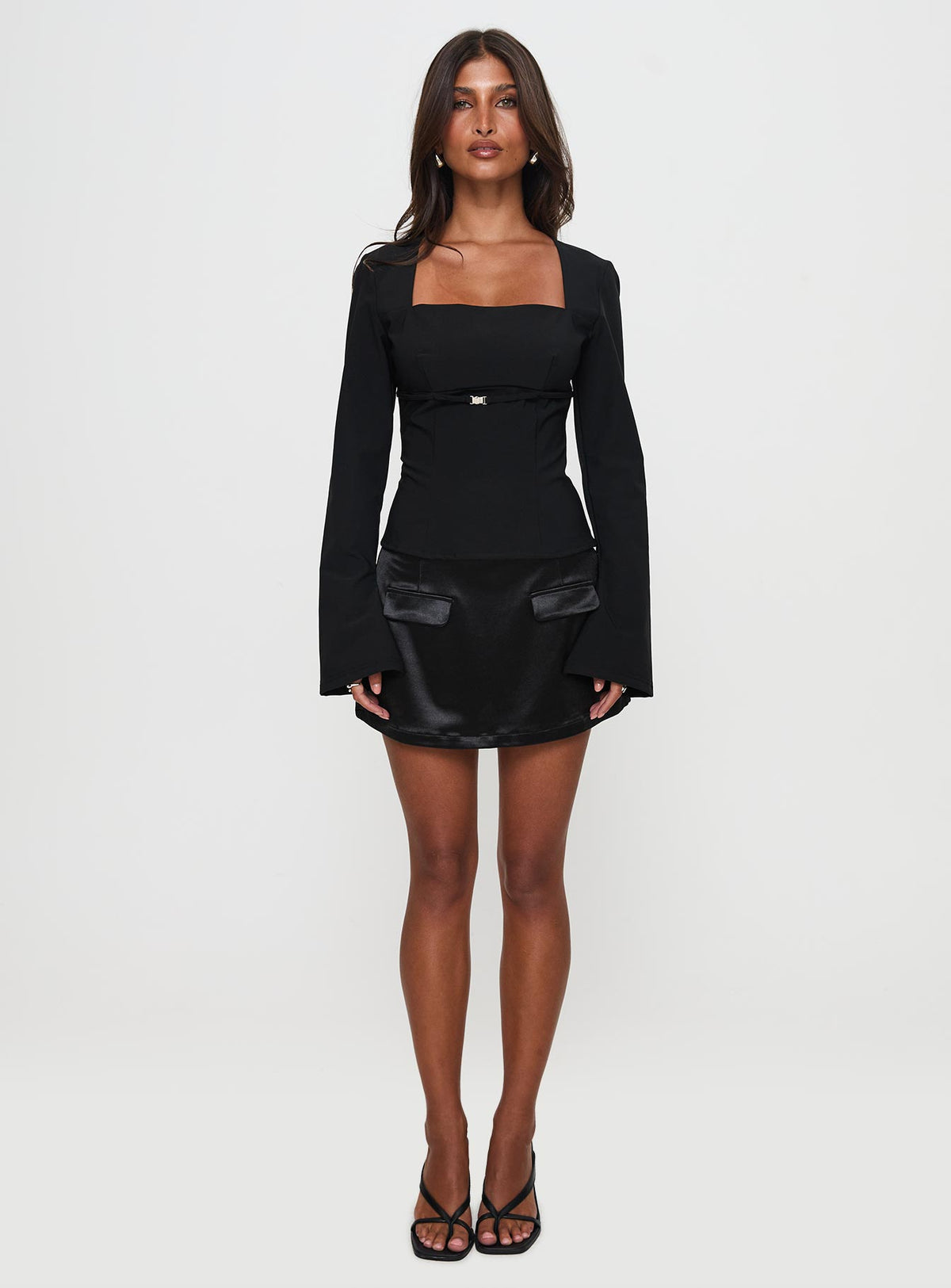 front view of model wearing Princess Polly Flounce Long Sleeve Top Black Full Sleeves Square Neck 