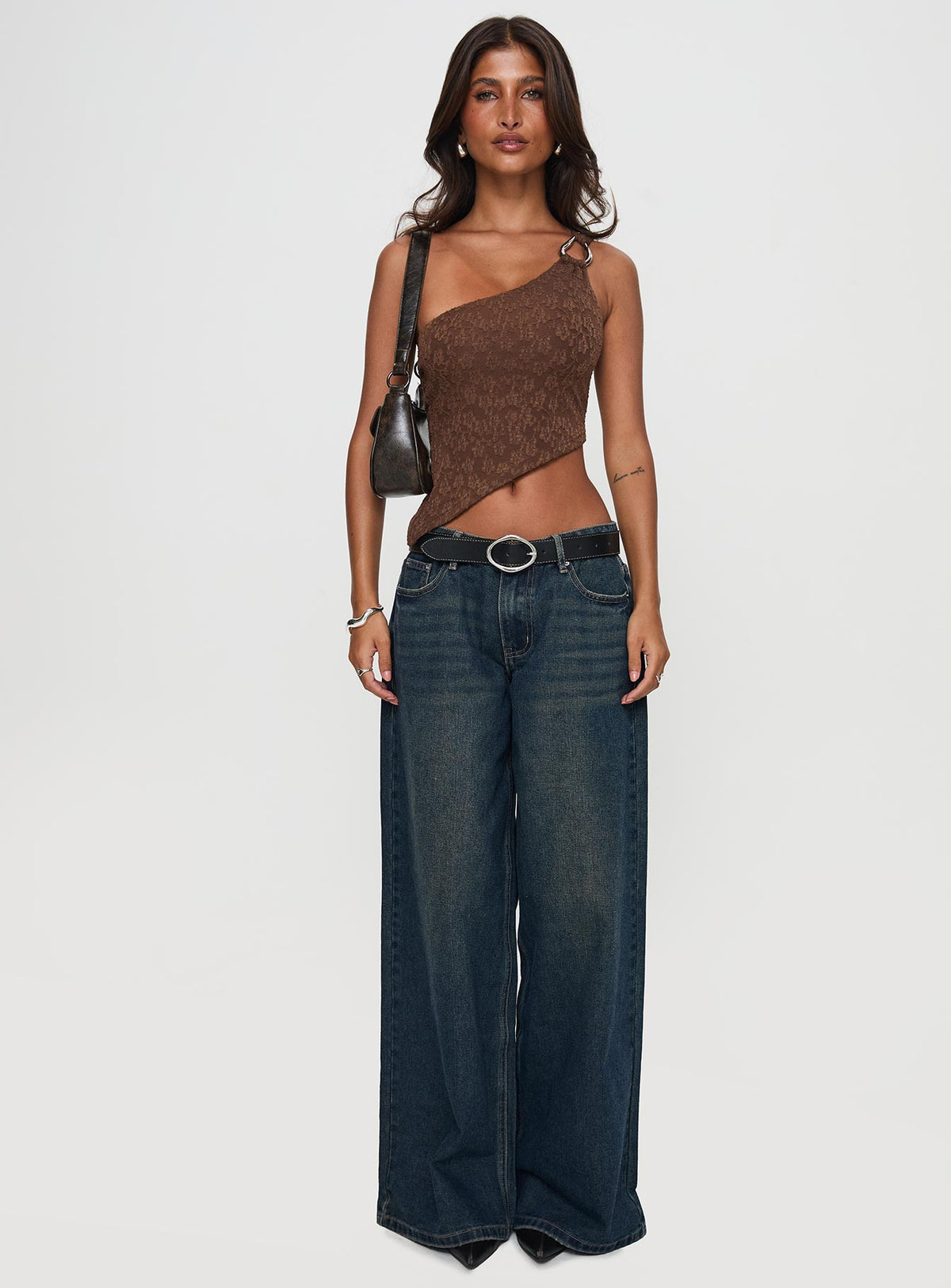 front view of model wearing Princess Polly Low Rise Wide Leg Jean Hocus Pocus Wash Low Rise Jeans 