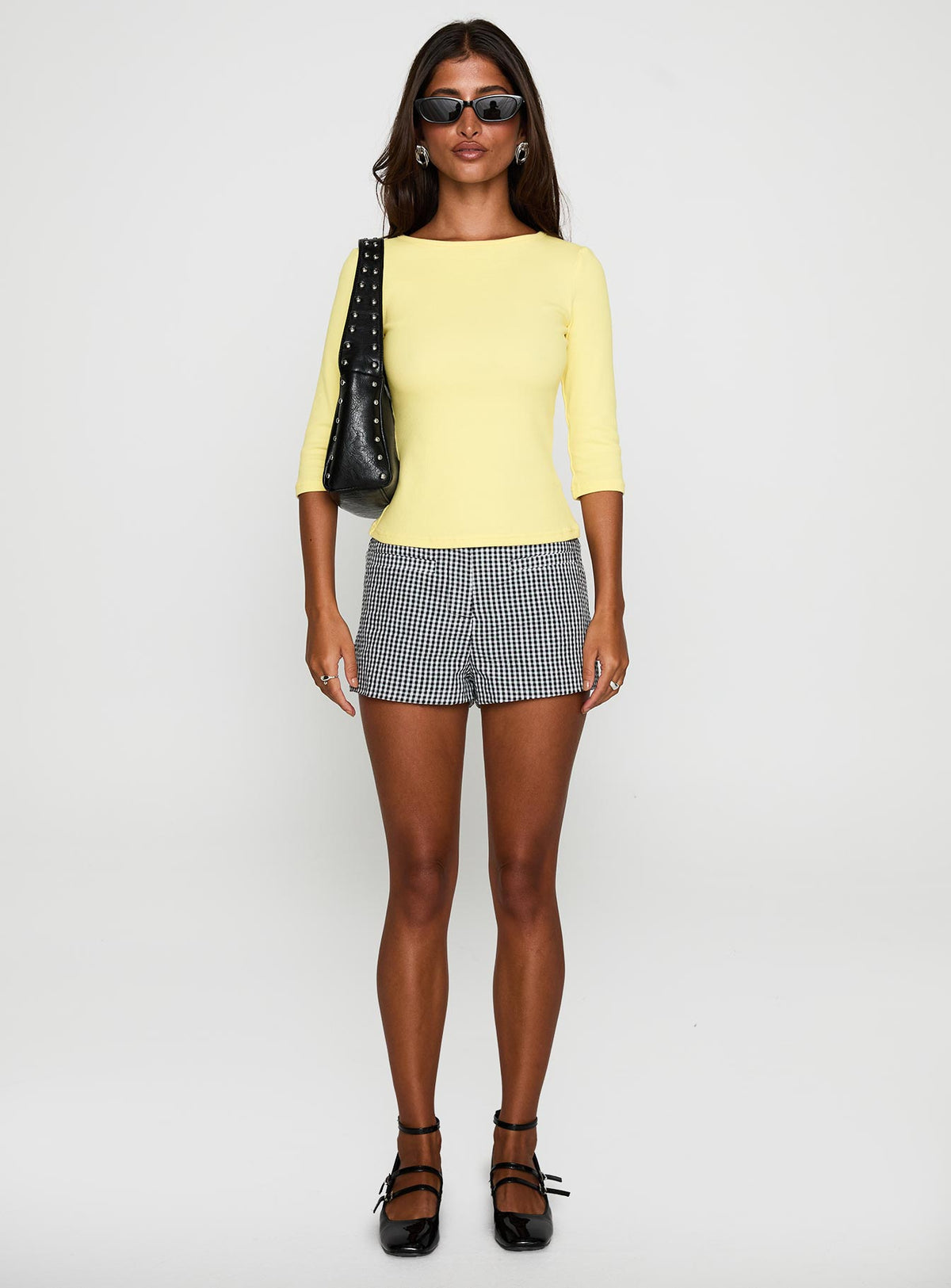 back view of model wearing Princess Polly Elaia 3/4 Sleeve Top Yellow Three Fourth Sleeves Crew Neck 