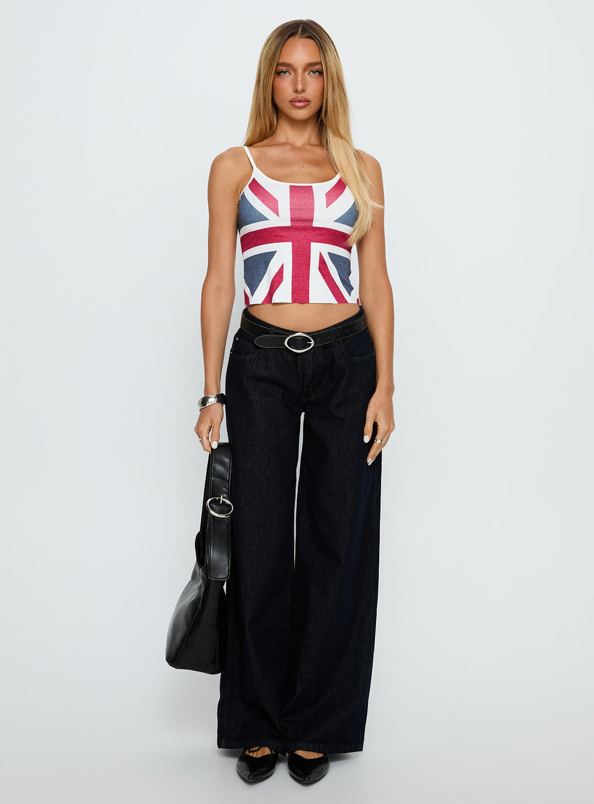 front view of model wearing Princess Polly Ramos Low Rise Wide Leg Jeans Raw Indigo Blue Low Rise Jeans Jeans 