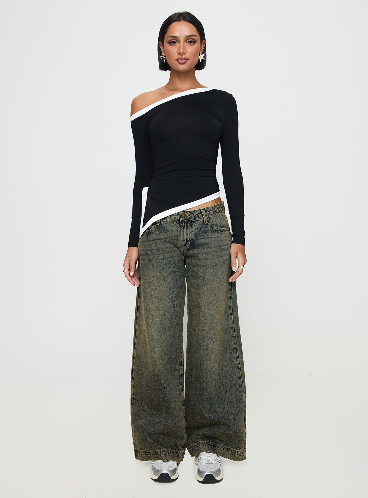 front view of model wearing Princess Polly Fake Smile Long Sleeve Top Black Full Sleeves Asymmetric Neckline 