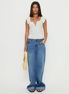 front view of model wearing Princess Polly Jacobie Mid Rise Wide Leg Jeans Mid Blue Wash Mid Rise Jeans Jeans 