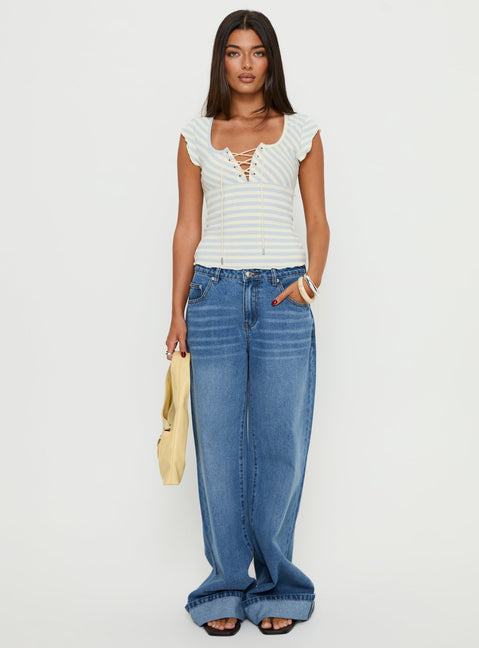 front view of model wearing Princess Polly Jacobie Mid Rise Wide Leg Jeans Mid Blue Wash Mid Rise Jeans Jeans 