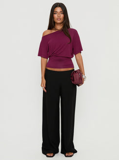 Featuring the Khane Low Rise Wide Leg Pant Black Tall in womens-regular-pants with low-rise waist front view of model wearing Princess Polly