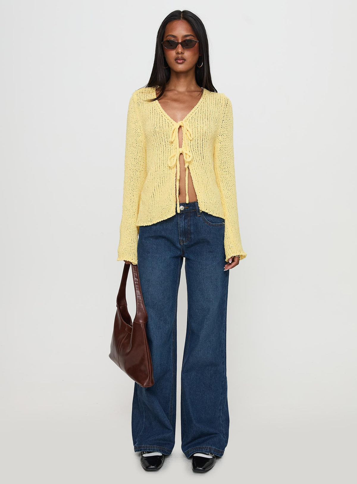 side view of model wearing Princess Polly Swain Knit Cardigan Lemon Jumpers 