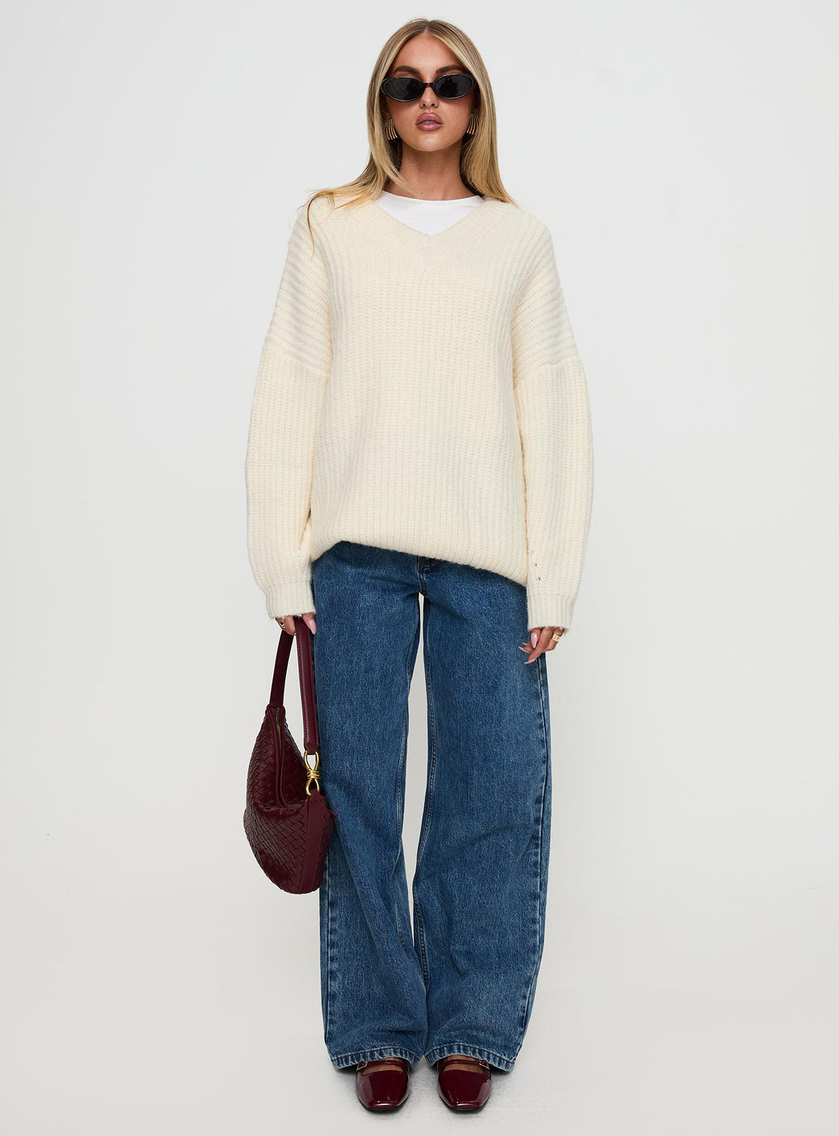 front view of model wearing Princess Polly Have It All V Neck Knit Sweater Cream Long 