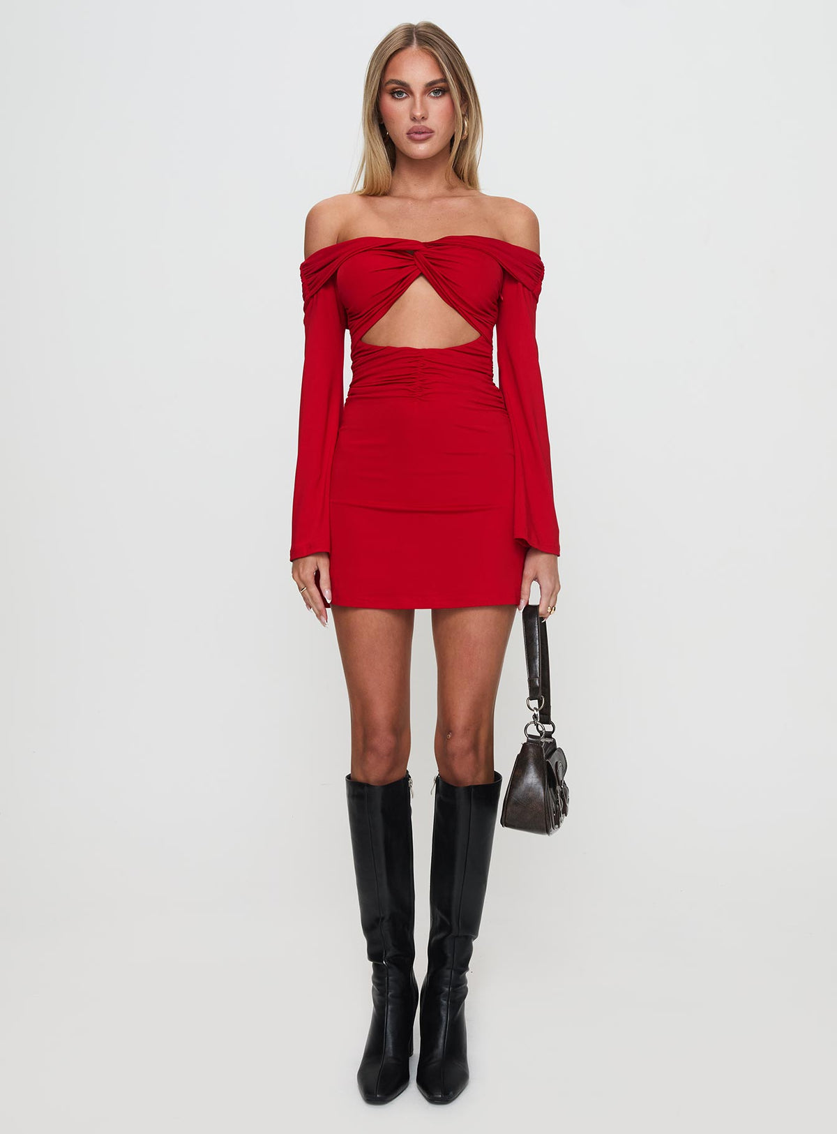 side view of model wearing Princess Polly Vistoria Long Sleeve Mini Dress Red Straight Neck 