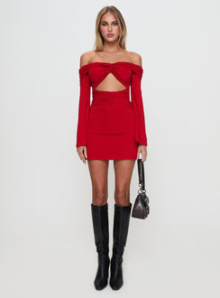 side view of model wearing Princess Polly Vistoria Long Sleeve Mini Dress Red Straight Neck 