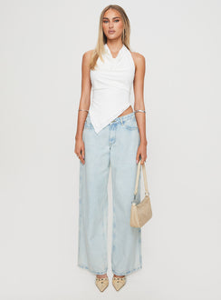 front view of model wearing Princess Polly Brayden Low Rise Relaxed Jeans Light Acid Wash Low Rise Jeans Jeans 